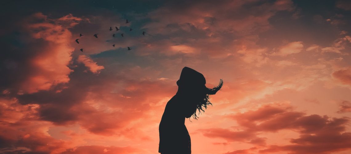 silhouette-photo-of-woman-during-dawn-1835016